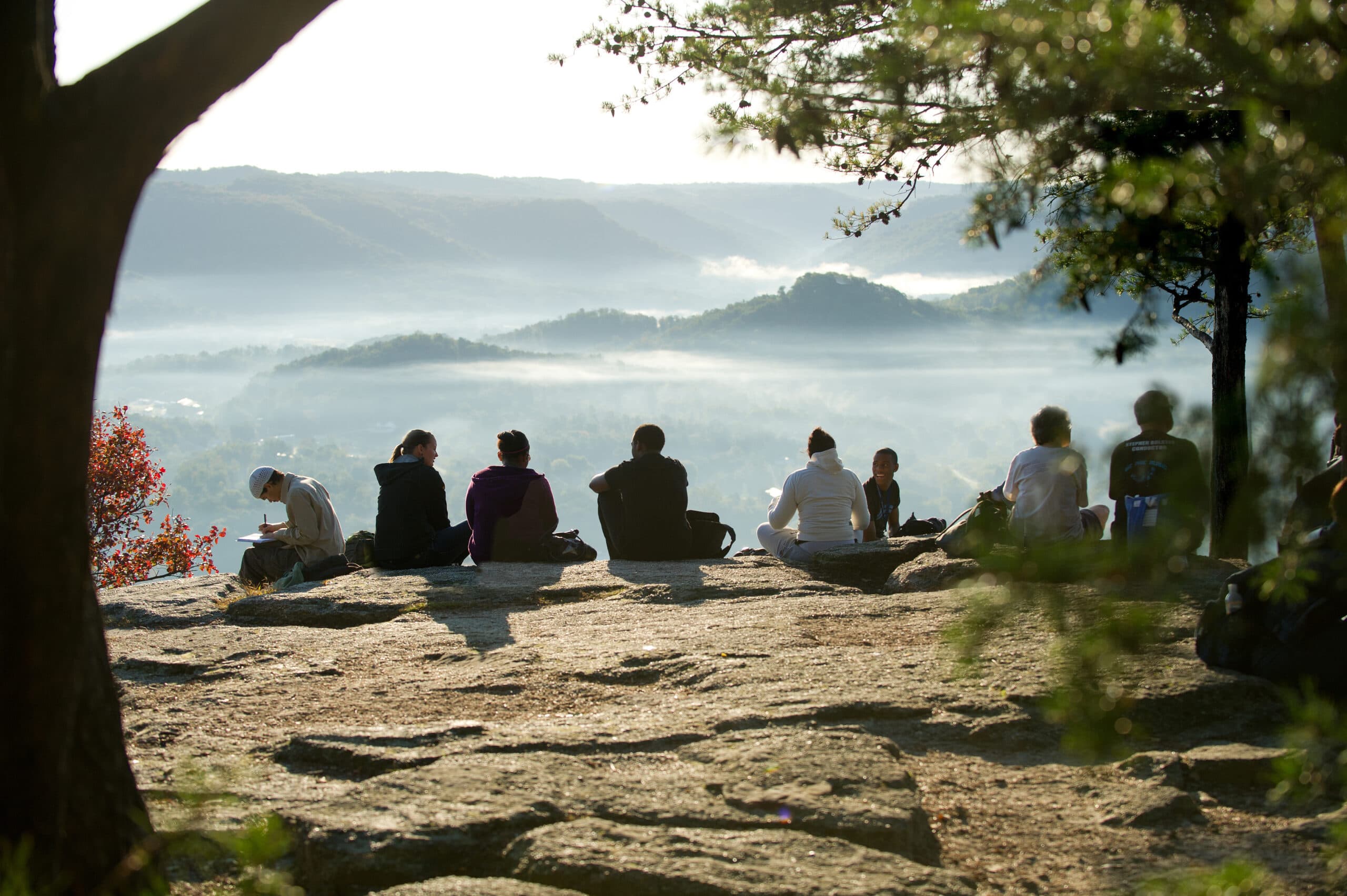 Berea College students enjoy the morning view from the east Pinnacle