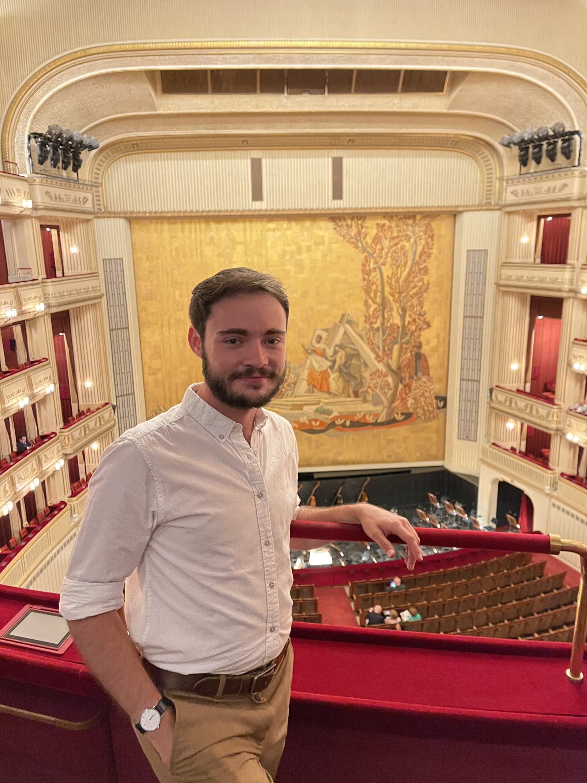 Photo of Shannon White in a theatre where he traveled abroad