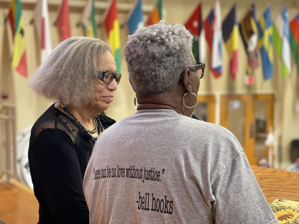 Speaker Beverly Guy-Sheftall with bell’s sister, Gwenda Motley.