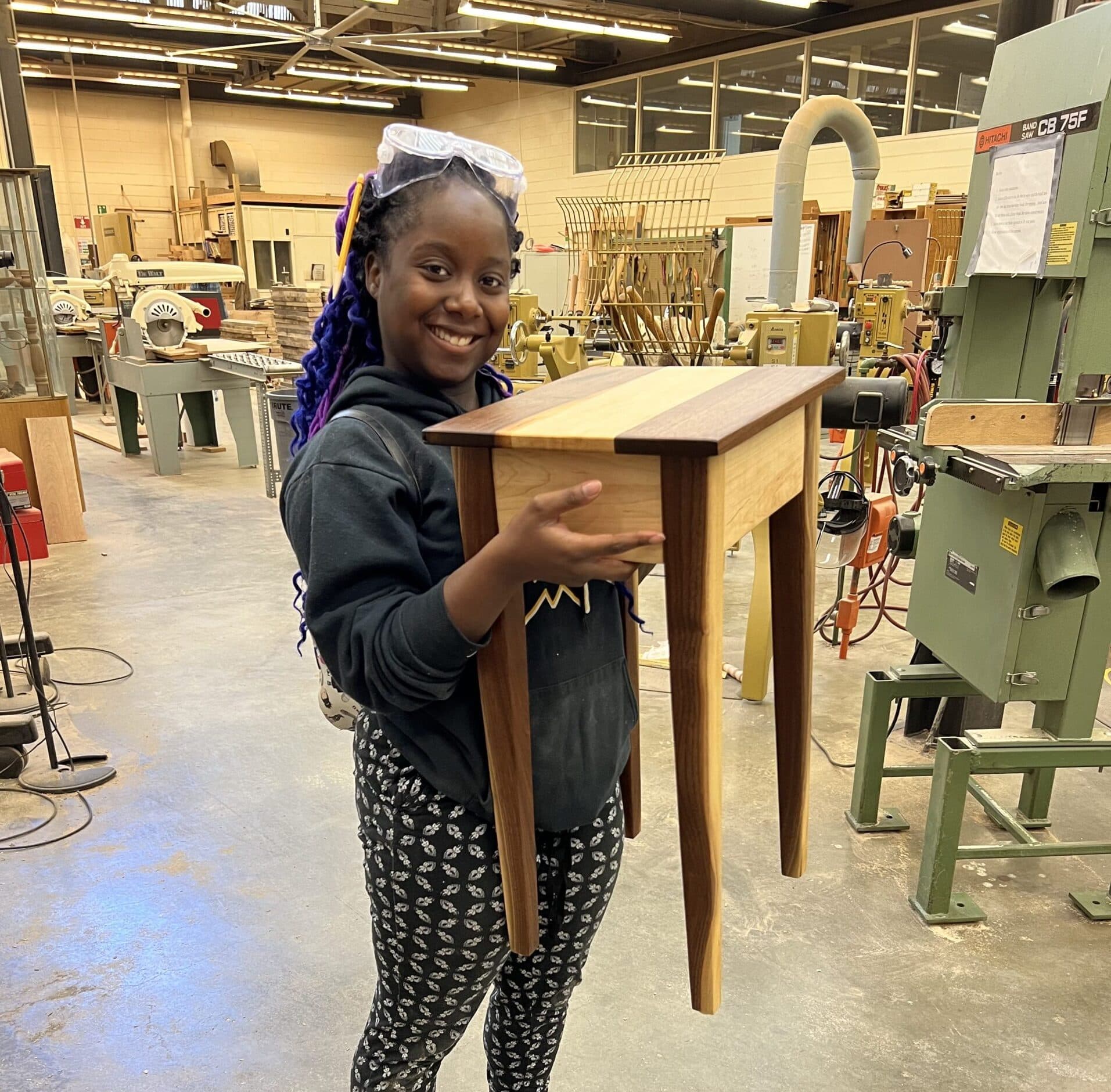 Ja'Lynn Stanley '21 and her completed table from the Westervelt Program