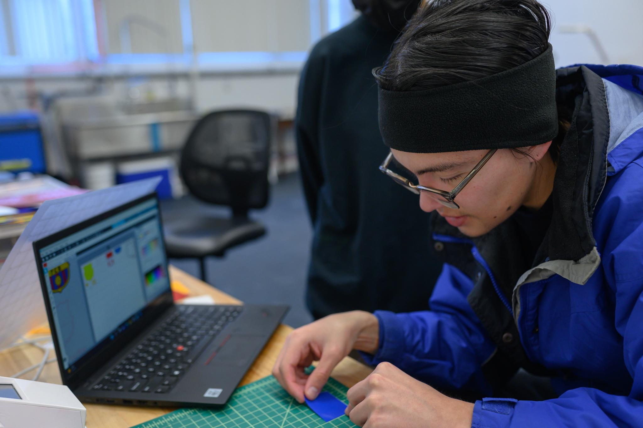 Student with computer